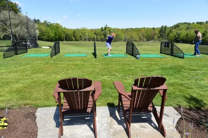 Driving range with adirondack chairs